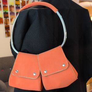 Vintage Unique Orange Bag With A Metal Handle
